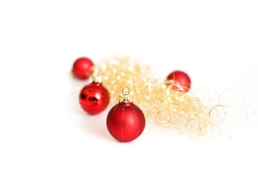 forur red christmas balls with golden decoration