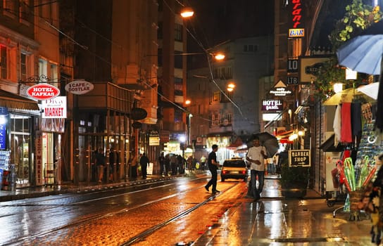 Istanbul, Turkey - June, 2011: Night street scene in Istanbul after the rains, landscape, copy space and crop area