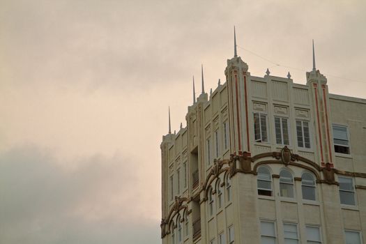 Deco building against a pale overcast sky