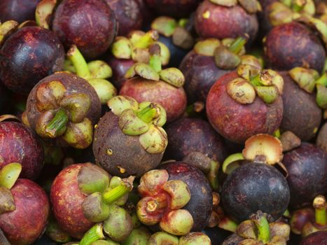 Mangosteen pile in a market in Malaysia