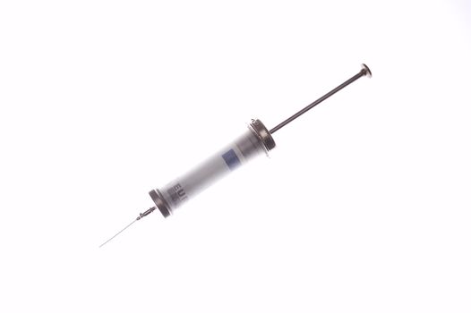 Cash injection or medical costs concept -  syringe with money inside