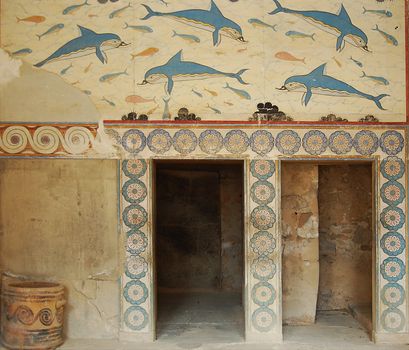 Antique ruins in Greece. Wall with animal and floral ornaments