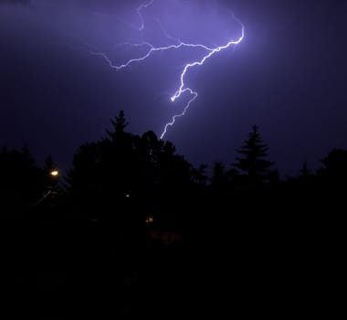 thunderbolt in the night sity stock photo