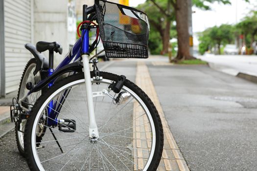 bicycle parked in city street