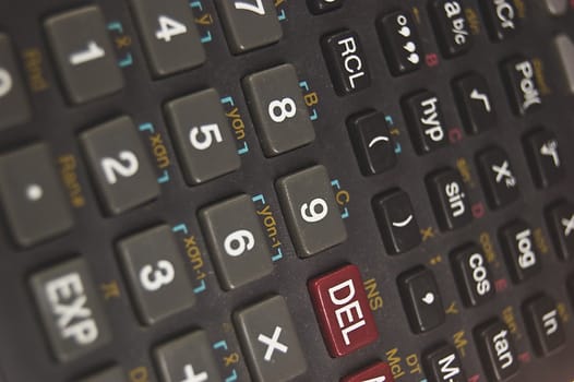 scientific calculator close up. Focus on numer 9