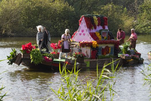 VLAARDINGEN - AUGUST 05: Each year this unique floating parade of beautiful decorated boats sail through the Westland. Theme this year: Theatre on water, August 05, 2011, Vlaardingen, the Netherlands

