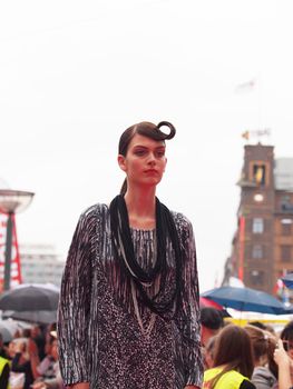 COPENHAGEN - AUGUST 14 : Participating model at the longest ever catwalk during the Copenhagen Fashion Week. 220 models joins the mile long catwalk on August 14, 2010 in Copenhagen, Denmark. 