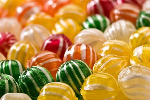 food serias: sweet background of striped sugar candy