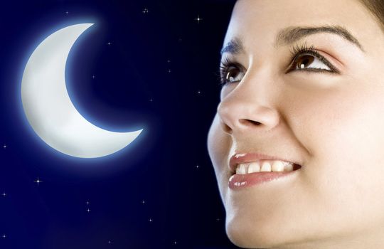 Portrait of a beautiful happy woman at night (moon created in PS)