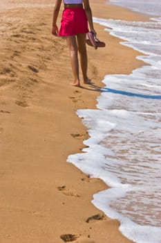 leisure series: girl's footstep on the sea sand