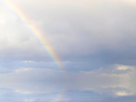 Real rainbow formed during rainfall in the Mediterranean