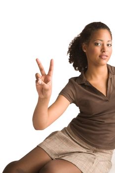 Beautiful african young woman gives a peace sign