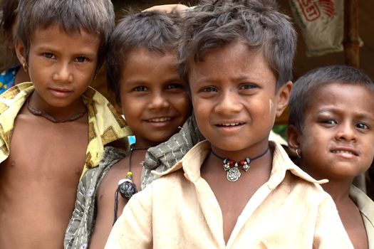 a group of poor boys in India