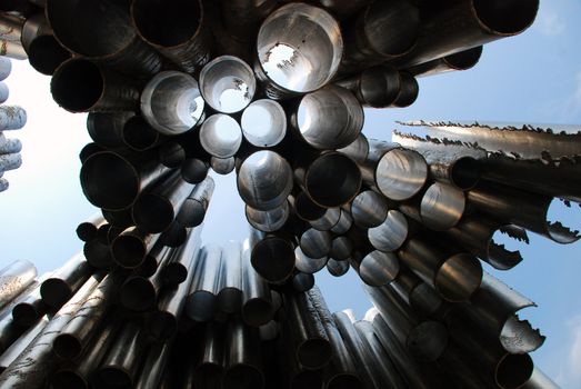 An original monument in Helsinki, finland, named Sibellius monument. It's composed of many iron pipes.
This photo was taken from the floor and we can see the sky throughout thes pipes.