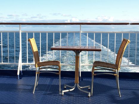 table and chairs at cruise ship