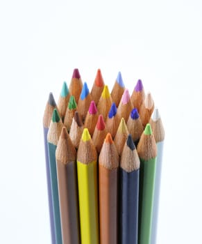 Circulary group of colored pencils on a white  background