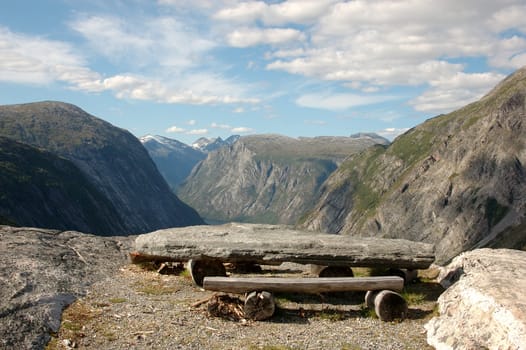 Picnic table on top of a mountain, overlooking a Norwegian glacial valley; Finsetlia, Eikesdalen