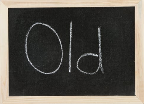 Black chalk board with wooden framed surround with the word Old