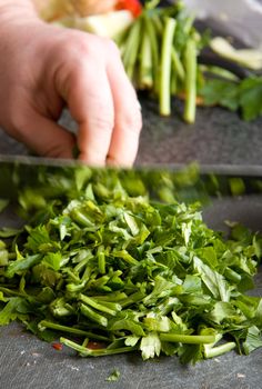 someone is chopping parsley