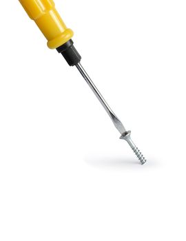 Industrial concept. Closeup of screwdriver and screw on white background. Isolated with clipping path