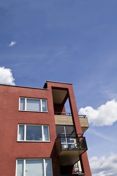 Modern executive Apartments i front of blue sky