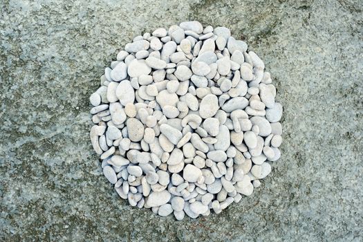 Abstract background. Coastal pebbles in round shape