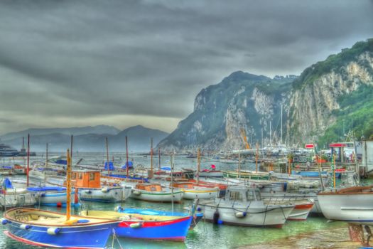 Imaged of the boats of Capri harbor processed to appear is if they were painted.