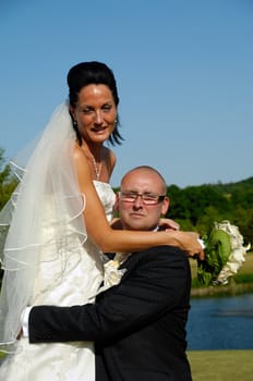 Bride and groom together holding each other