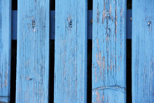 old weathered used blue fence with panels