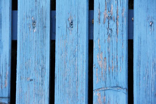 old weathered used blue fence with panels