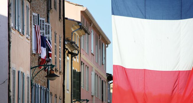 flags in the streets of france blue white and red