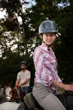 Equestrian couple posing on a horse ranch in Costa Rica