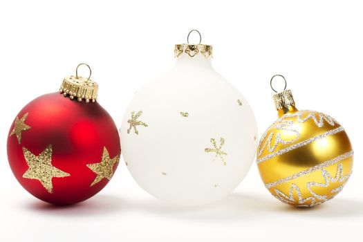 red white and golden christmas ball on white background