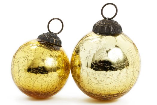 two vintage golden christmas balls on white background