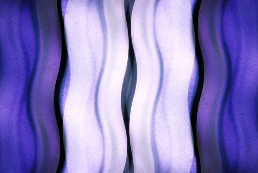 Abstract color background of backlit color glass.