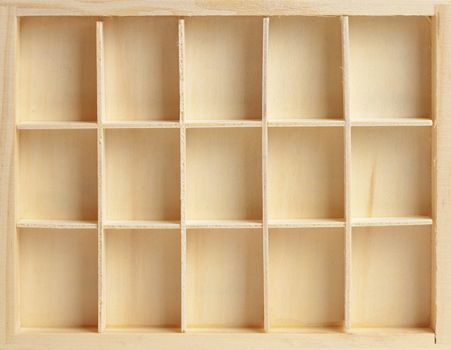 Wooden box on fifteen cells similar to a rack