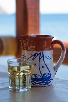 A jug with greek white house wine, taken on Thasos Island.