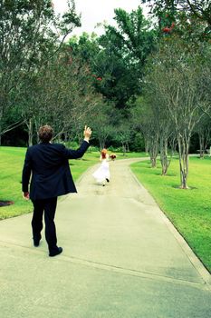 Cross processed photo of a bride running away from her groom