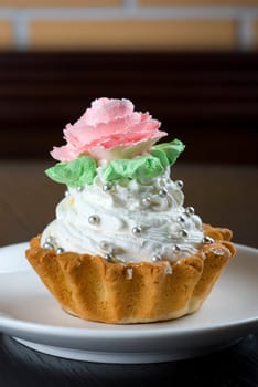 fresh baked cupcake on a wooden table