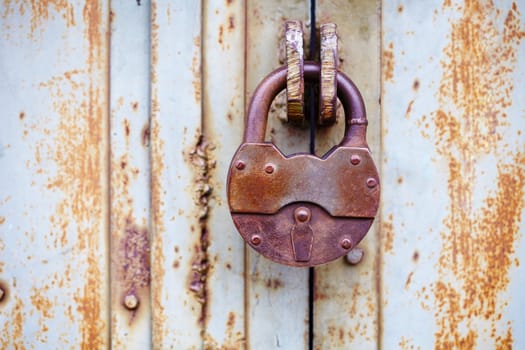 The big ancient padlock on a door