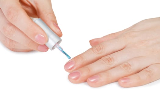 Female hands on white. Nail polish drawing.