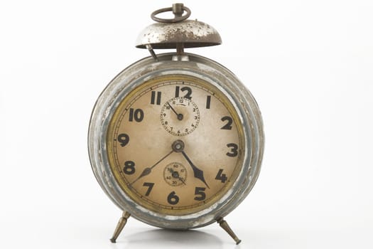 old alarm-clock with bell on white background