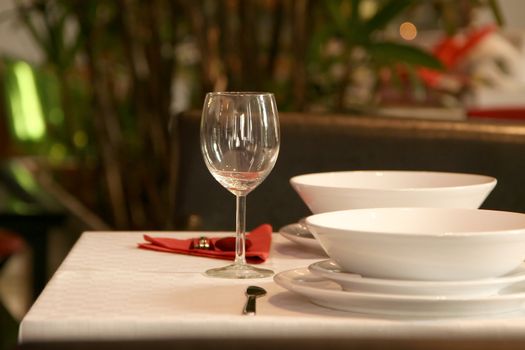 restaurant table with wine glass, romantic dinner