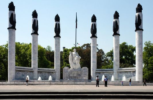 Monument scultpure and columns around square in Mexico city