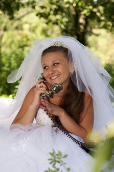 Bride of the telephone in an outdoor