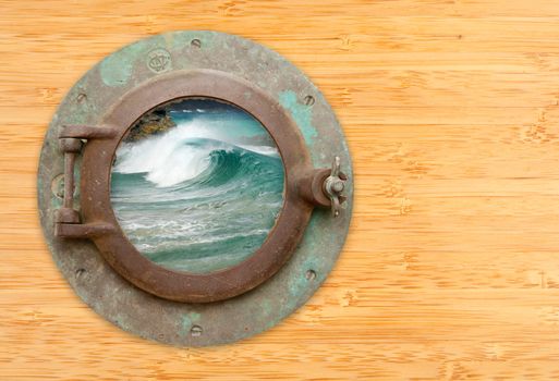 Antique Porthole with View of Crashing Waves on a Bamboo Wall Background.