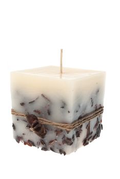 Side view of a candle isolated on white background.