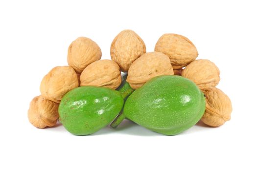 Ripe and unripe walnuts isolated on white