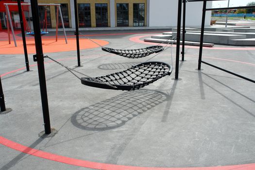  Modern creative design city playground swings made from metal and ropes                              
