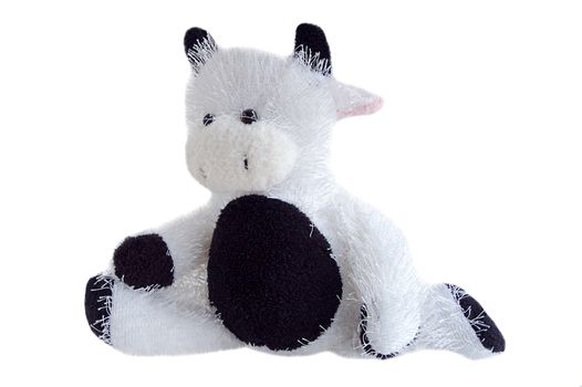 stuffed toy cow doing a split, isolated on white.